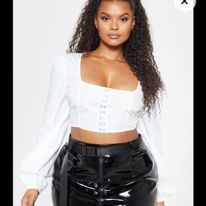 Black vinyl mini skirt